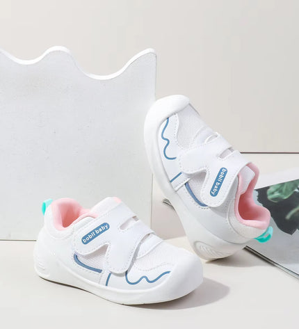 White toddler sneakers with pink lining and Velcro straps – lightweight baby shoes