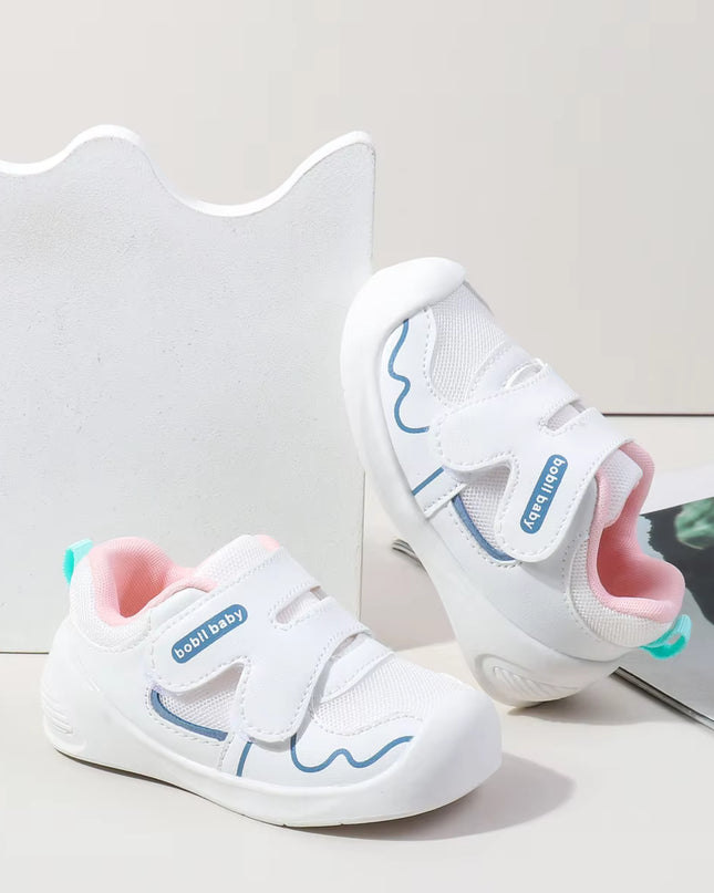 White toddler sneakers with pink lining and Velcro straps – lightweight baby shoes