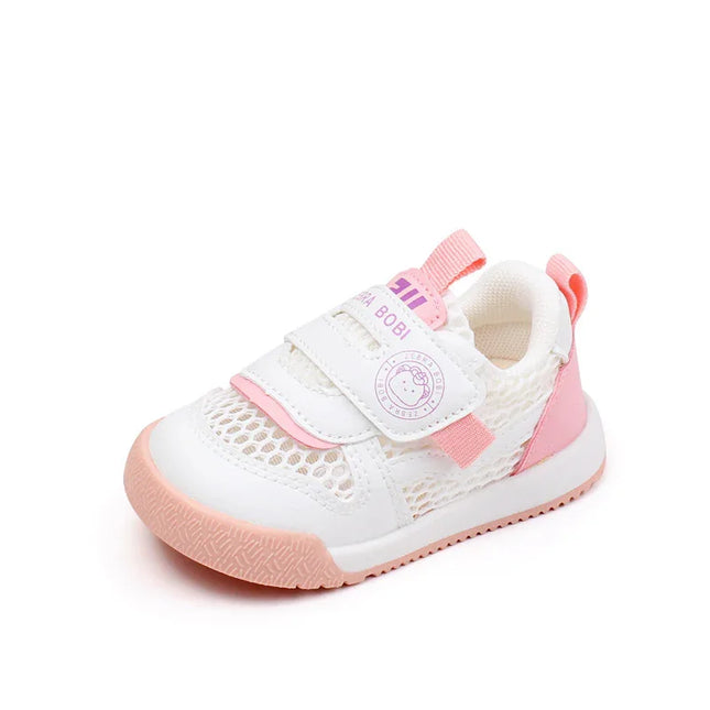 baby shoes in pink and white  with soft soles and a secure Velcro strap—comfortable and breathable footwear for infants and toddlers
