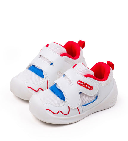 White toddler sneakers with red lining, blue accent and Velcro straps – lightweight baby shoes