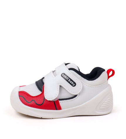 White toddler sneakers with black lining, red accent and Velcro straps – lightweight baby shoes