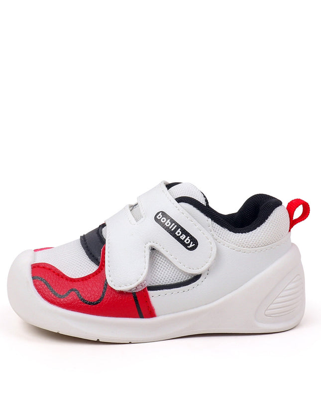 White toddler sneakers with black lining, red accent and Velcro straps – lightweight baby shoes
