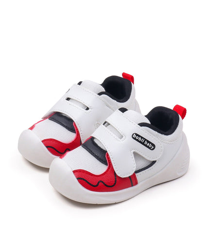 White toddler sneakers with black lining, red accent and Velcro straps – lightweight baby shoes