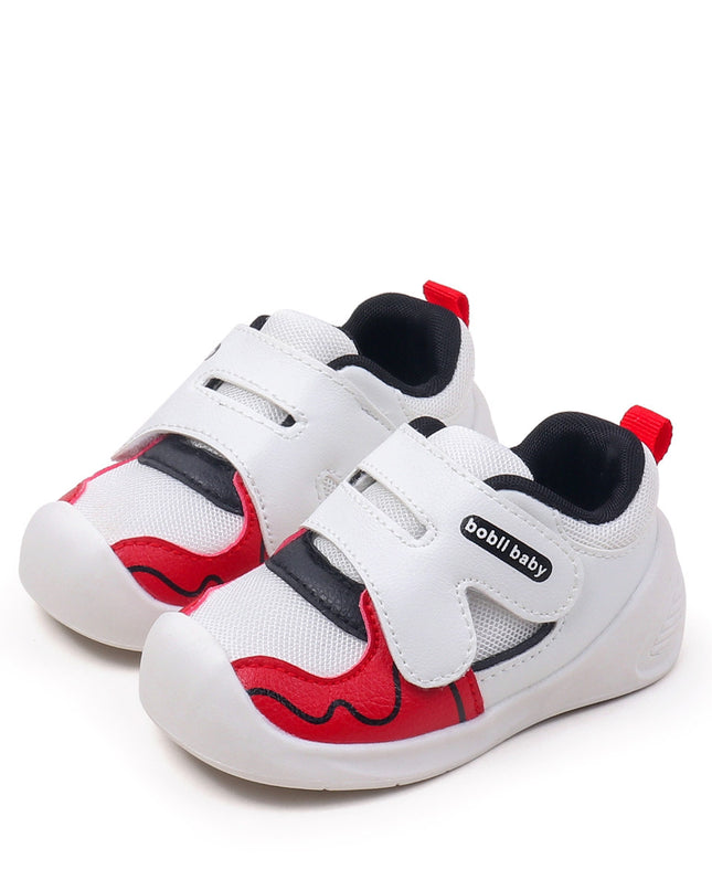 White toddler sneakers with black lining, red accent and Velcro straps – lightweight baby shoes