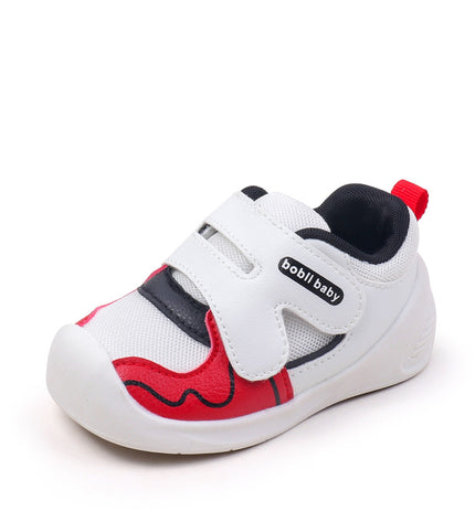 White toddler sneakers with black lining, red accent and Velcro straps – lightweight baby shoes