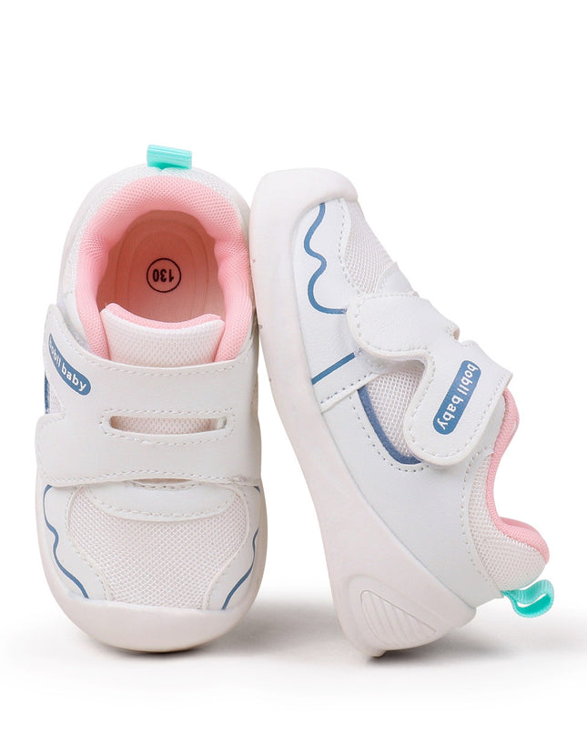White toddler sneakers with pink lining and Velcro straps – lightweight baby shoes