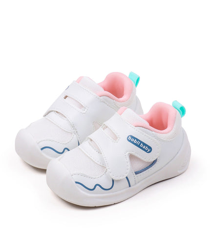 White toddler sneakers with pink lining and Velcro straps – lightweight baby shoes