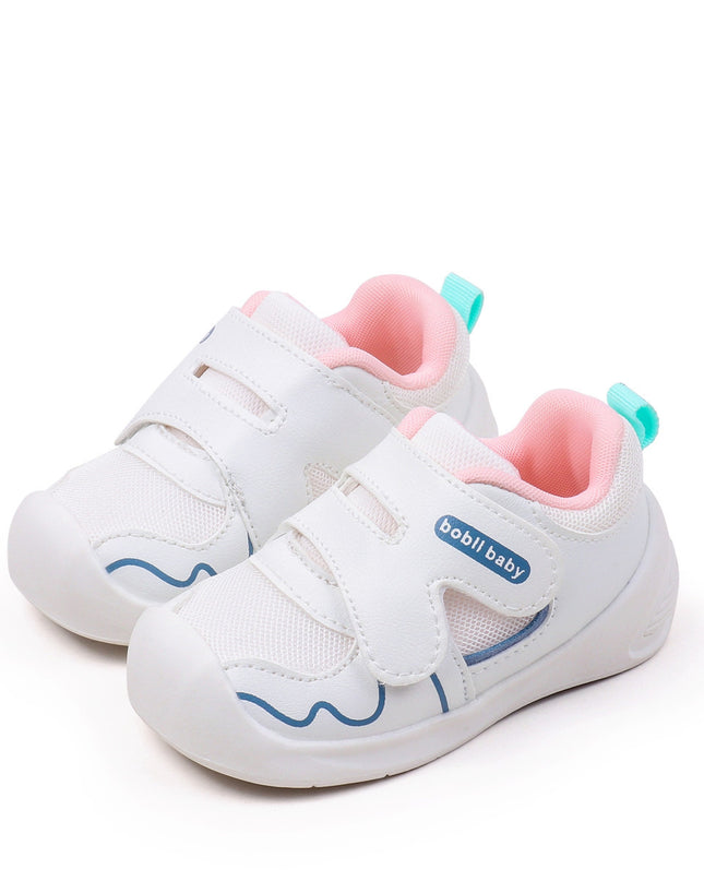 White toddler sneakers with pink lining and Velcro straps – lightweight baby shoes
