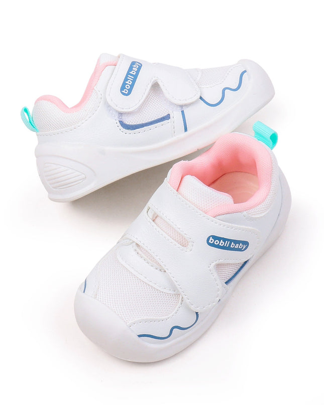 White toddler sneakers with pink lining and Velcro straps – lightweight baby shoes